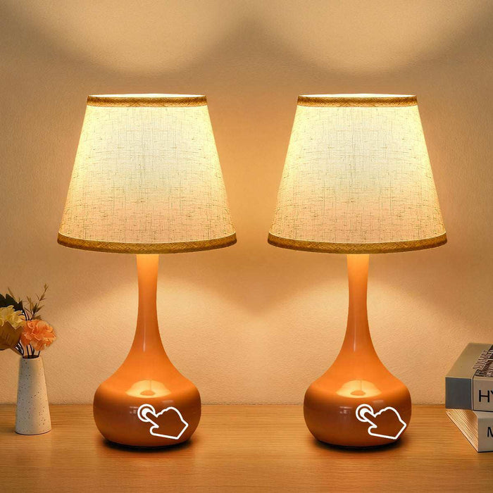2-piece set of three level dimming small table lamps with fabric shades on wooden surface