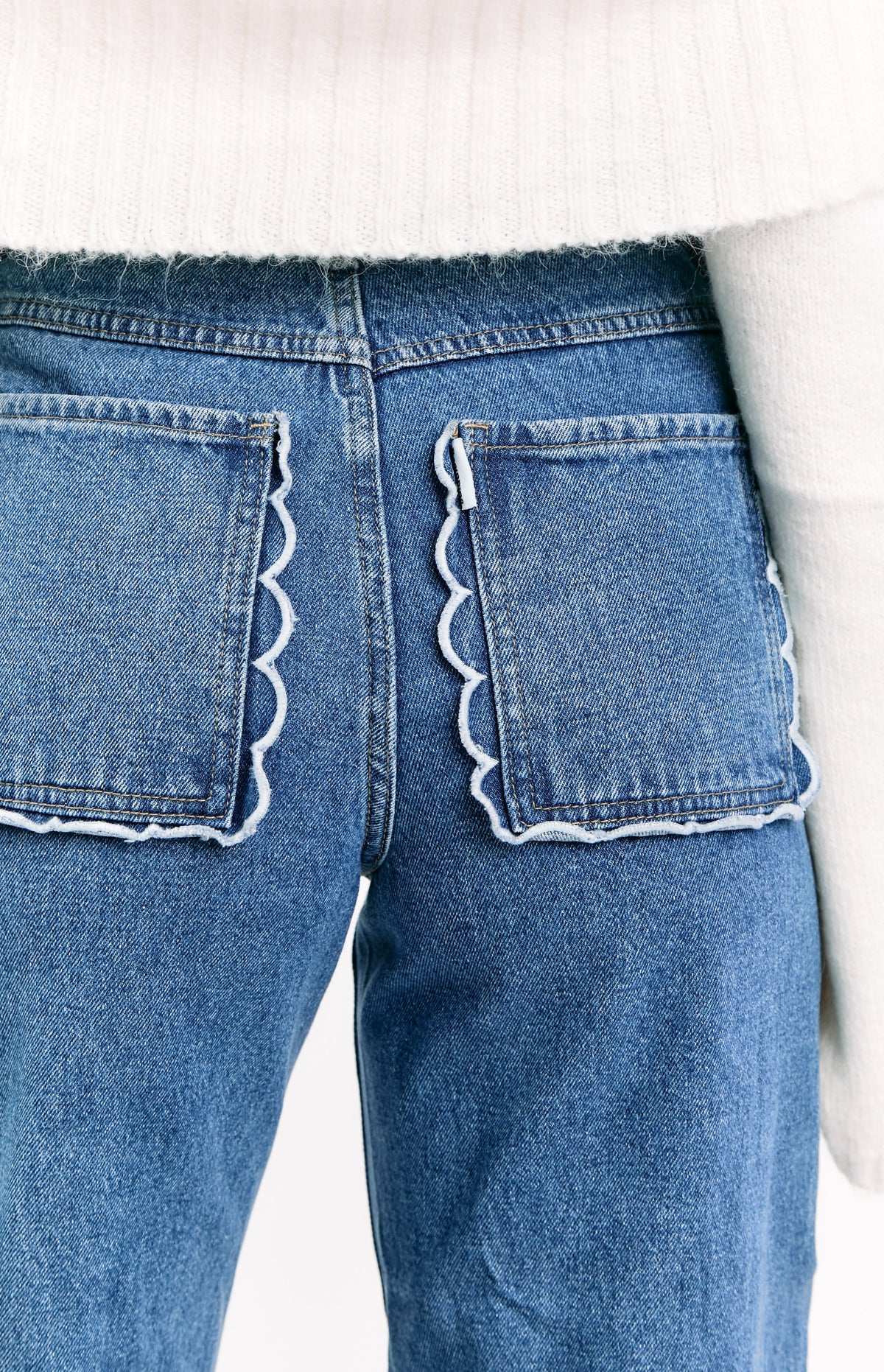 Kansis Mid Wash Scallop Pockets Uneven Waist Jeans