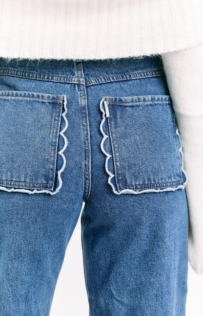 Kansis Mid Wash Scallop Pockets Uneven Waist Jeans