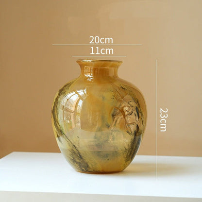 Clear lustrous glass vase with smooth polished finish for floral arrangements and home decor